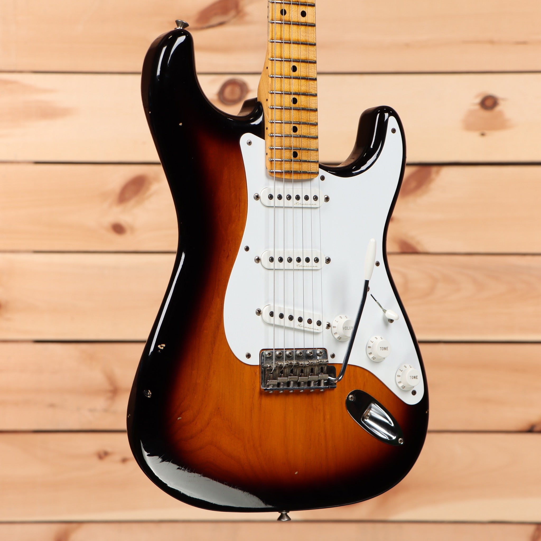 Pre-owned Fender Custom Shop Eric Clapton Signature Stratocaster Journeyman Relic 2-Color Sunburst electric guitar with white pickguard