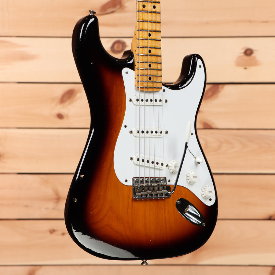 Pre-owned Fender Custom Shop Eric Clapton Signature Stratocaster Journeyman Relic 2-Color Sunburst electric guitar with white pickguard
