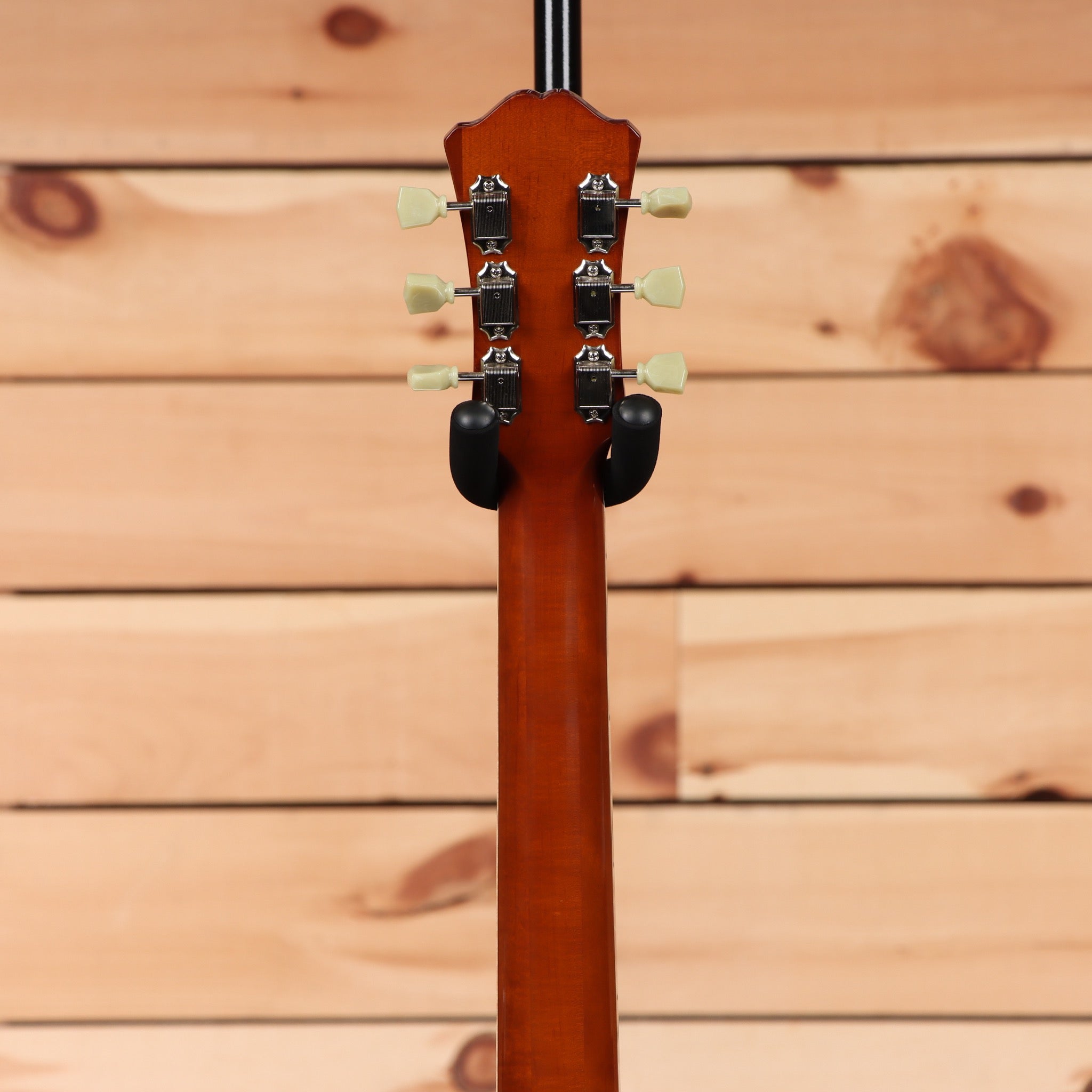 Eastman T184MX semi-hollow body electric guitar Goldburst finish with black pickguard and cream tuners
