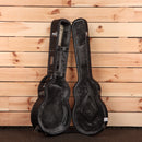 Eastman T184MX semi-hollow electric guitar Goldburst with open case displaying black velvet interior