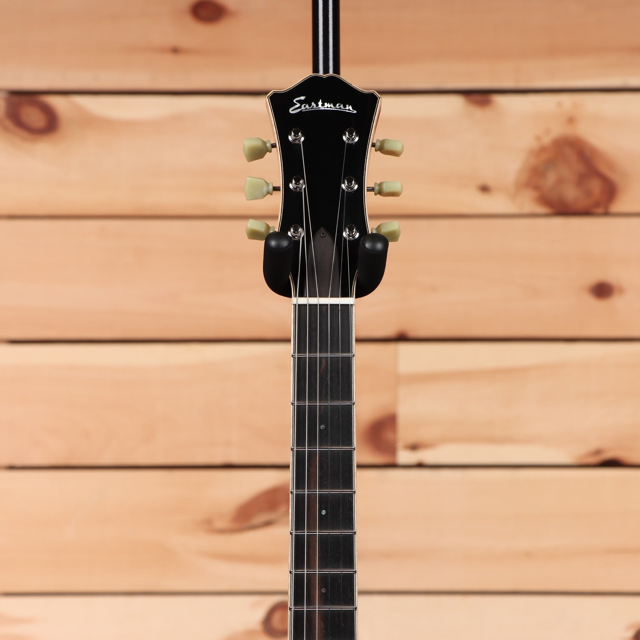 Eastman T186MX semi-hollow electric guitar Goldburst with cream tuning pegs and maple neck