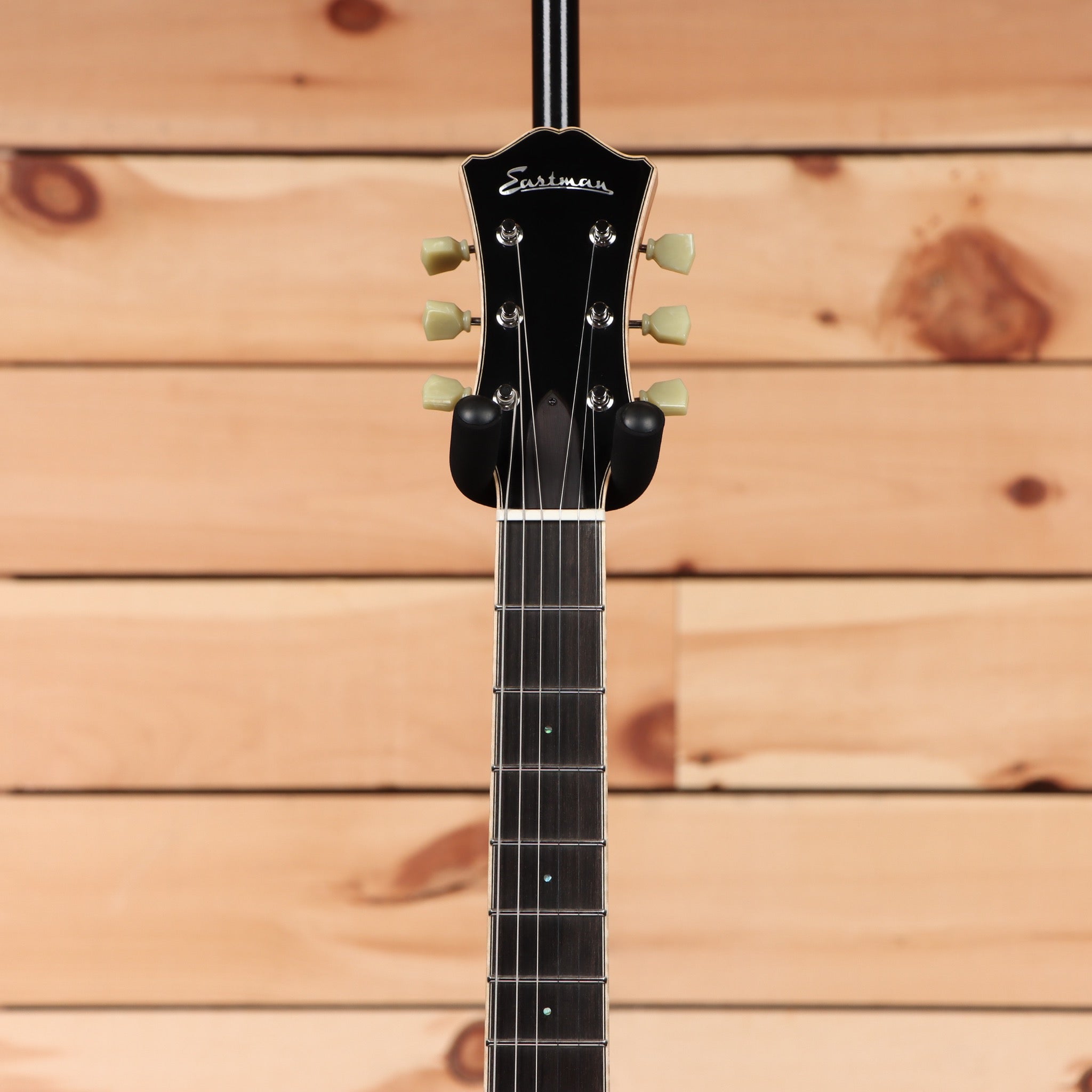 Eastman T185MX semi-hollow body electric guitar goldburst finish with vintage-style tuning pegs