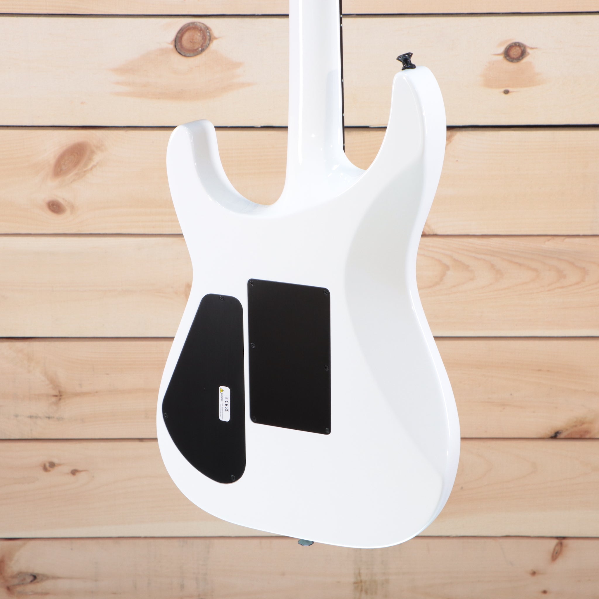 Jackson MJ Series Soloist SL2 electric guitar Snow White with black pickguard and humbucker pickups