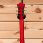 Eastman T64VRD semi-hollow electric guitar Antique Red with vintage-style tuning pegs