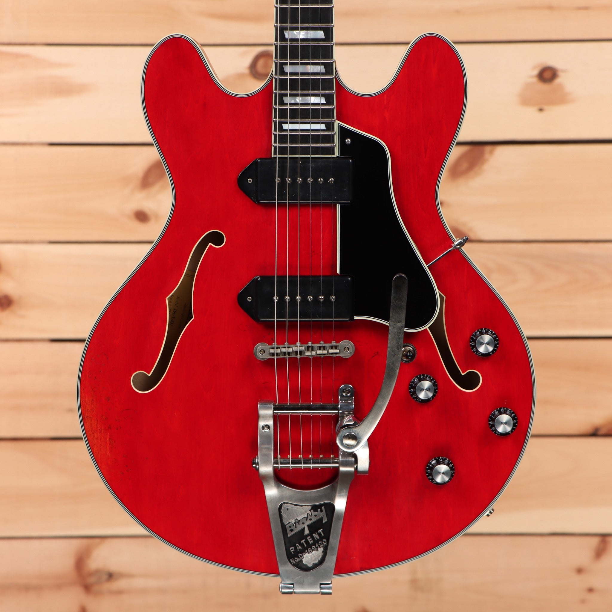 Eastman T64VRD semi-hollow electric guitar antique red with f-holes and bigsby tremolo bridge