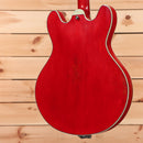 Eastman T64VRD semi-hollow electric guitar antique red with f-holes and cream binding