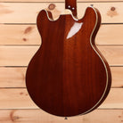 Eastman T185MX semi-hollow electric guitar goldburst finish with white binding and f-hole detail