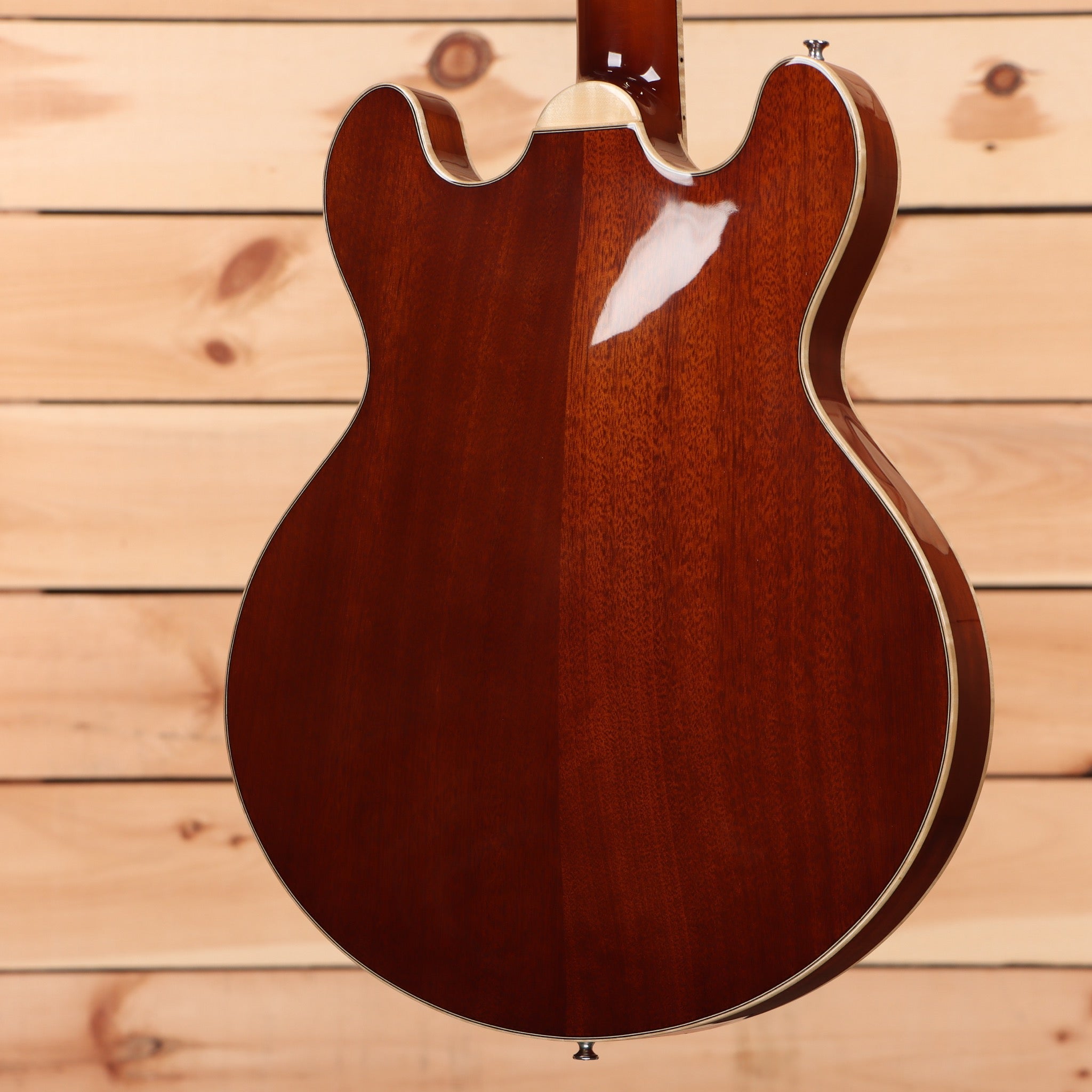 Eastman T185MX semi-hollow electric guitar goldburst finish with white binding and f-hole detail