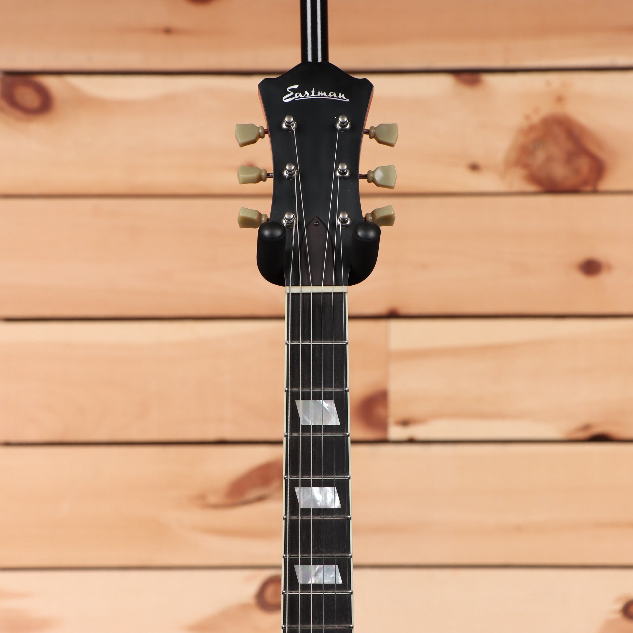 Eastman T64VRD semi-hollow body electric guitar Antique Red with dual humbuckers and maple neck