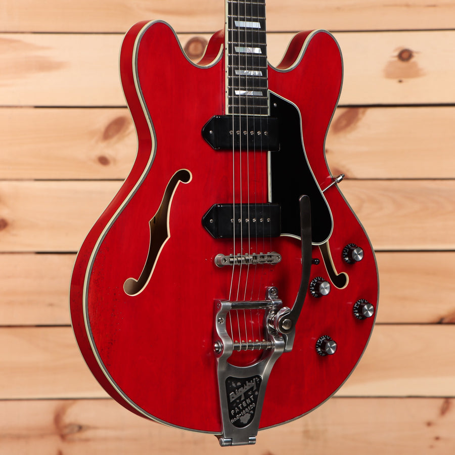 Eastman T64VRD semi-hollow electric guitar antique red with black pickguard and f-holes