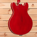 Eastman T64VRD semi-hollow electric guitar antique red with f-holes and elegant curved body