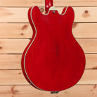 Eastman T64VRD semi-hollow electric guitar antique red with f-holes and elegant curved body