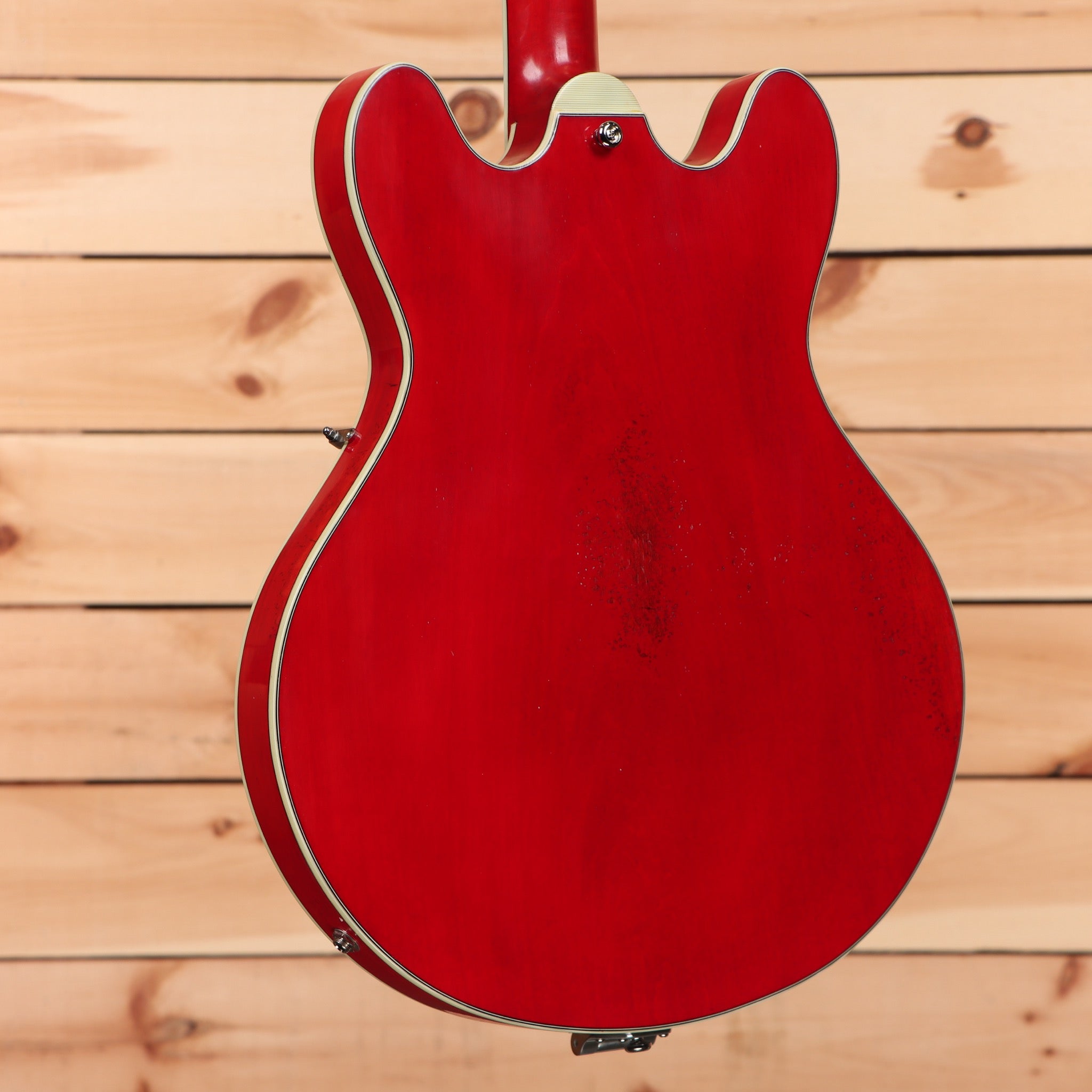 Eastman T64VRD semi-hollow electric guitar antique red with f-holes and elegant curved body