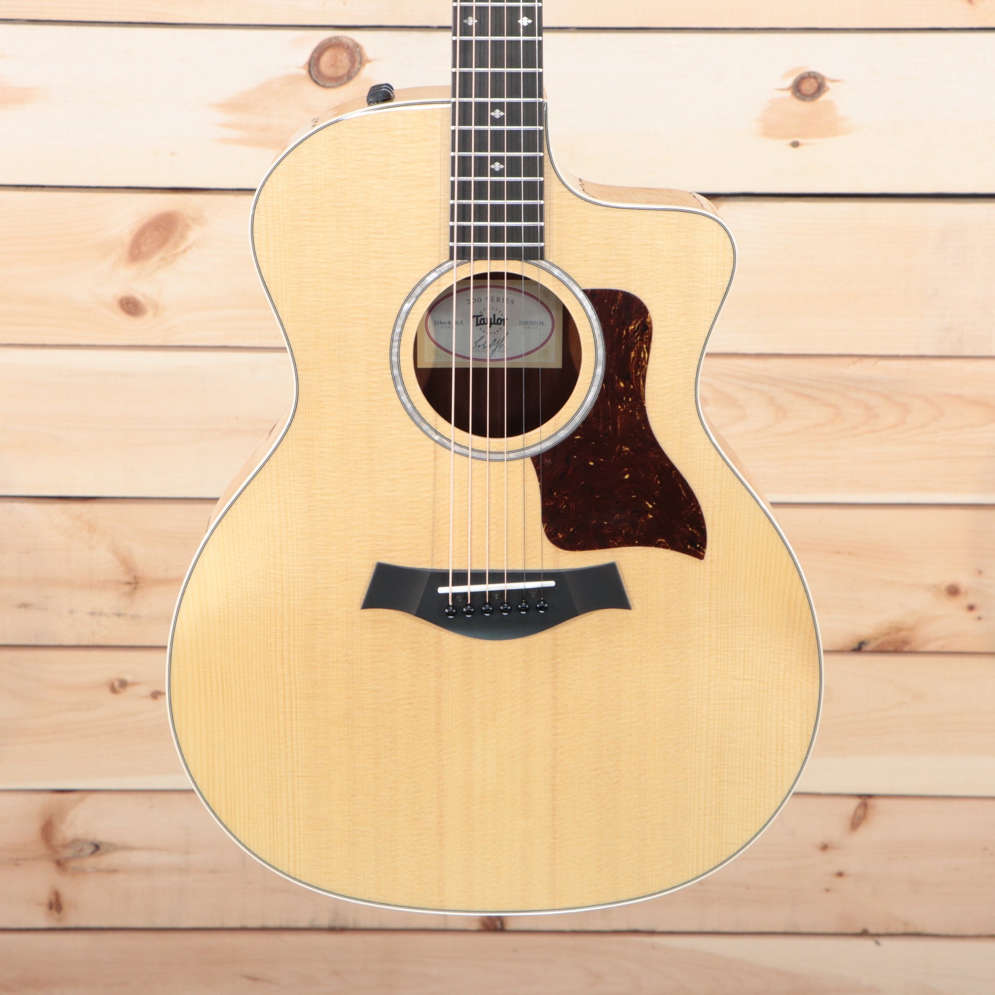 Taylor 214ce-K DLX Grand Auditorium acoustic-electric guitar natural finish with venetian cutaway