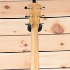 Taylor 214ce-K DLX Grand Auditorium acoustic-electric guitar natural finish with venetian cutaway and gold tuning machines