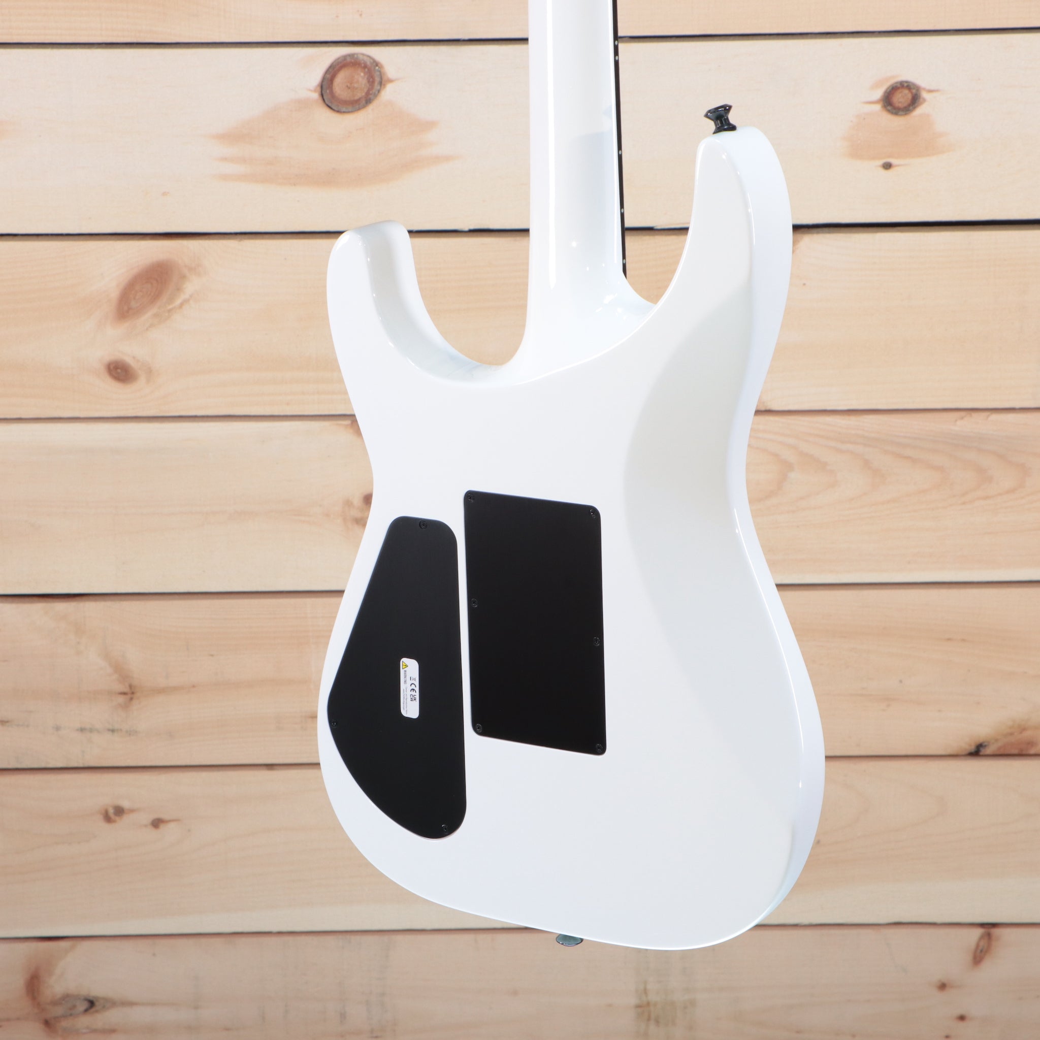Jackson MJ Series Soloist SL2 electric guitar Snow White with black pickguard and humbucker pickups