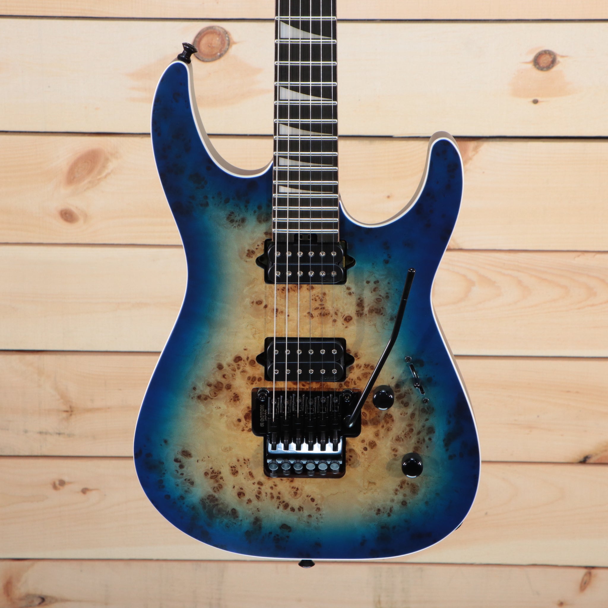 Jackson MJ Series Dinky DKRP electric guitar transparent blue burst with dual humbuckers and Floyd Rose tremolo