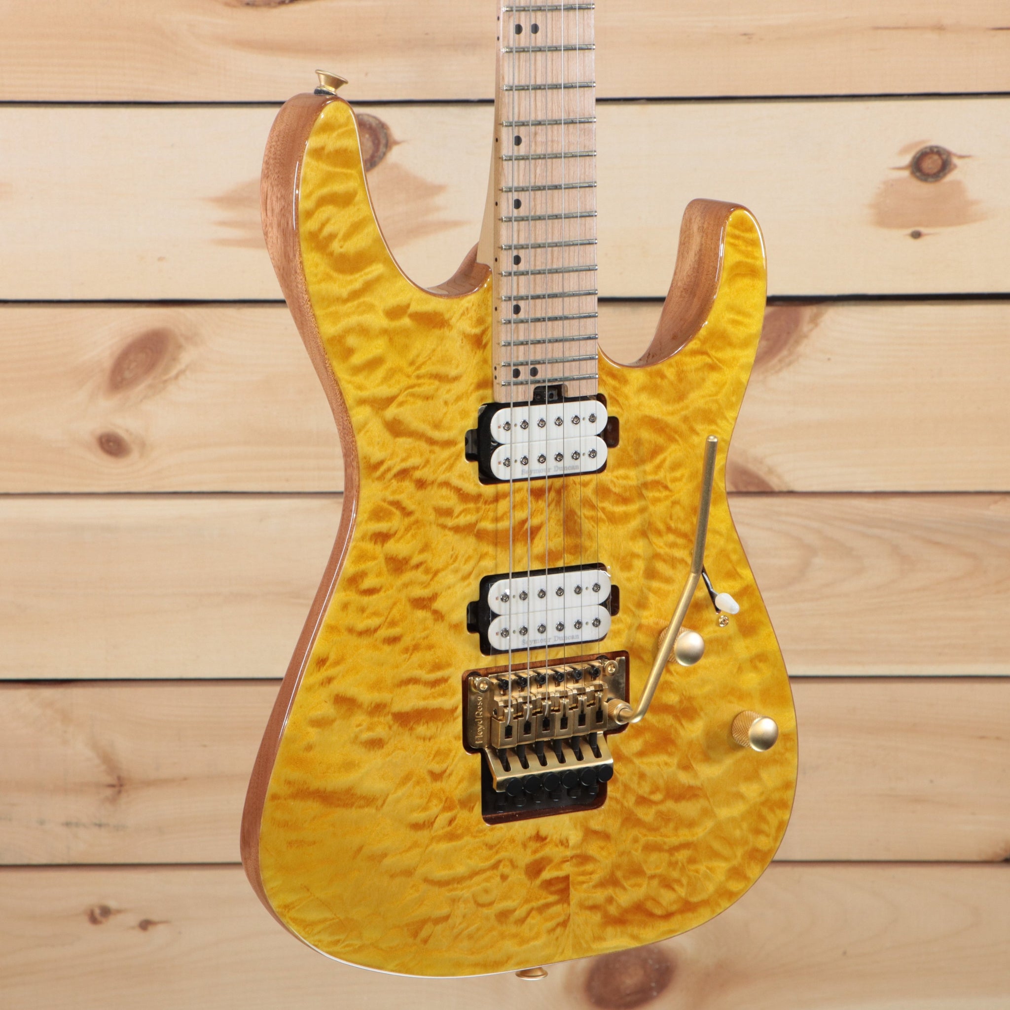 Charvel Pro-Mod DK24 HH FR M Mahogany with Quilt Maple - Dark Amber –  Righteous Guitars