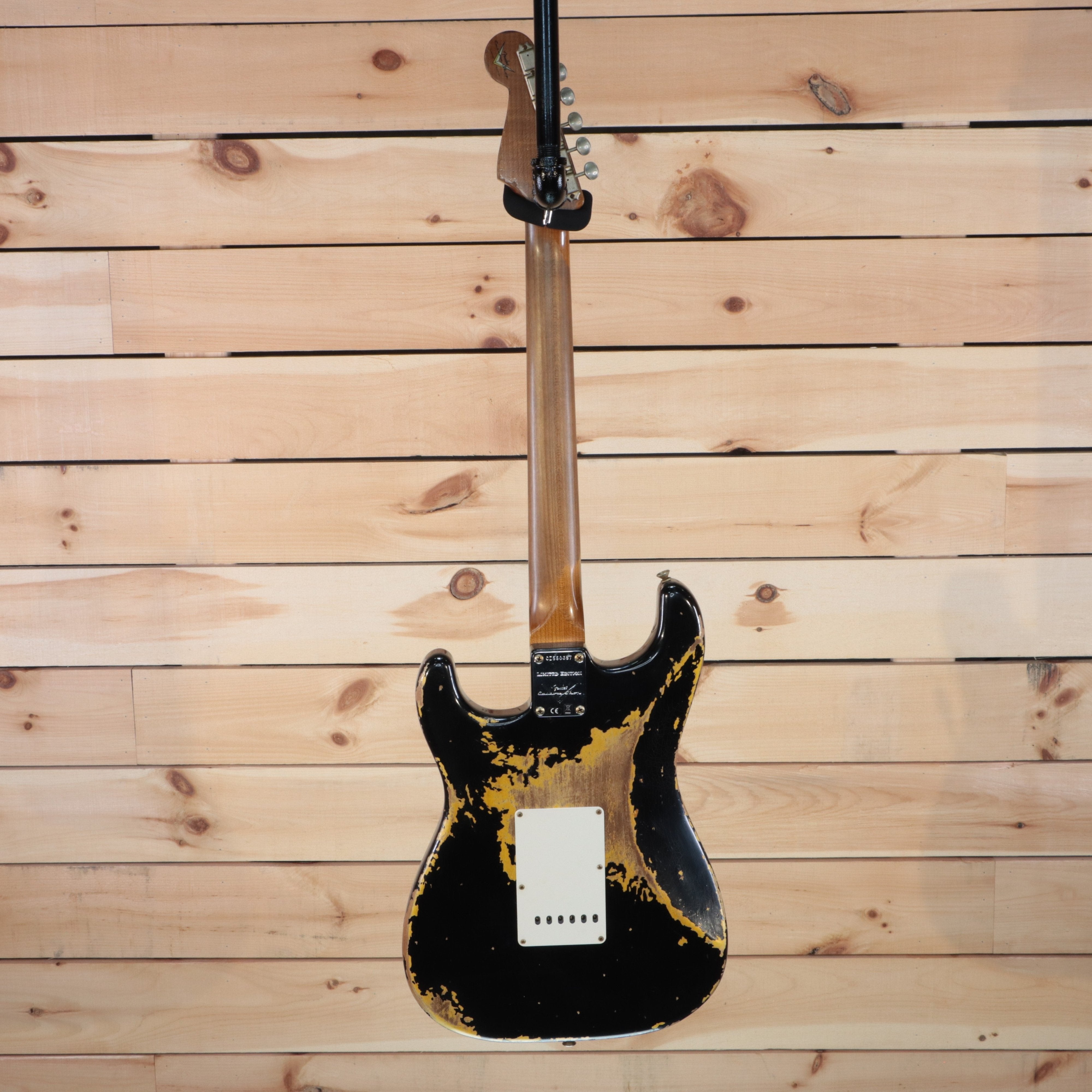 Fender Custom Shop LTD Roasted 1960 Stratocaster electric guitar black over gold heavy relic back view