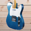 Fender 1955 Telecaster Relic electric guitar Blue Sparkle finish with white pickguard and maple neck