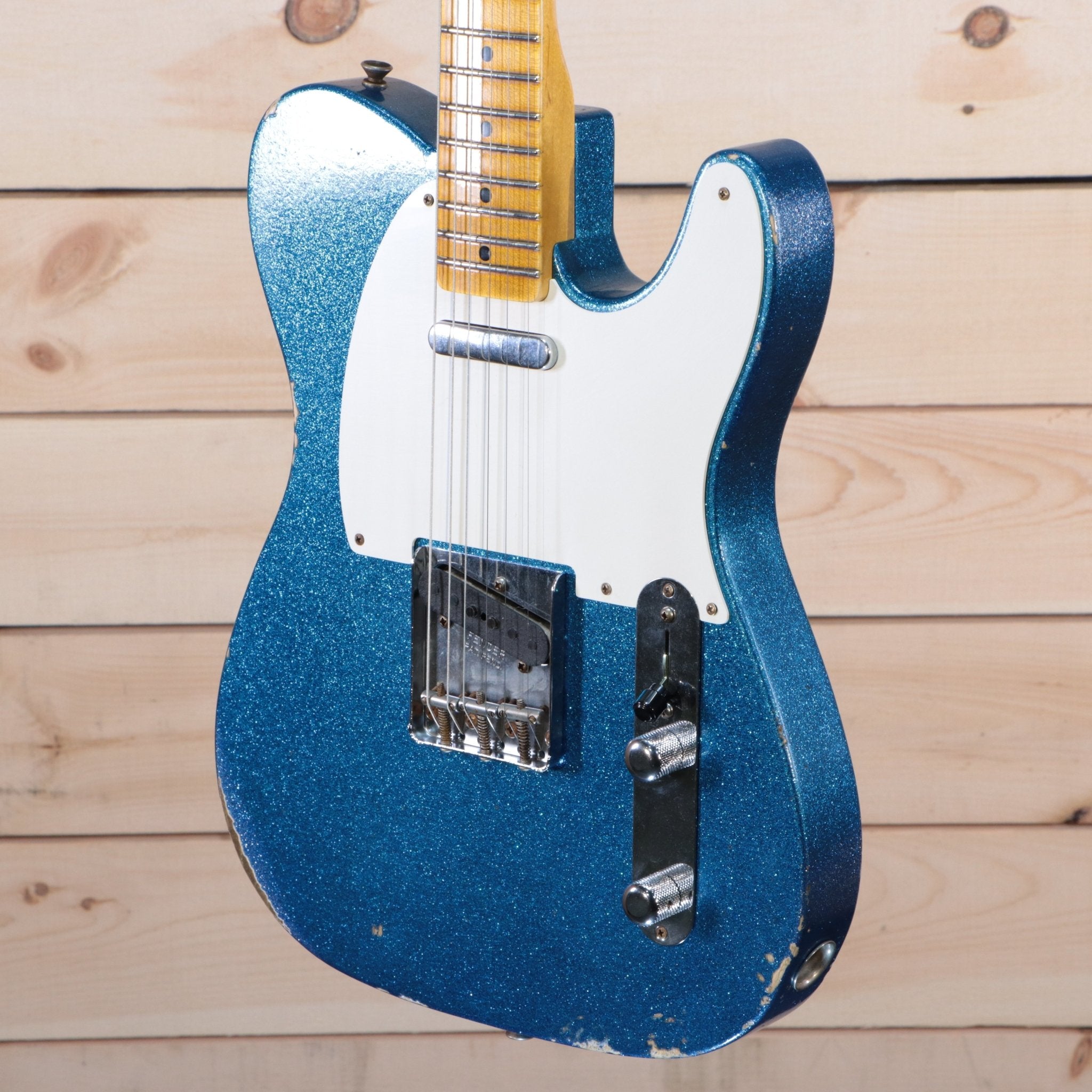Fender 1955 Telecaster Relic electric guitar Blue Sparkle finish with white pickguard and maple neck