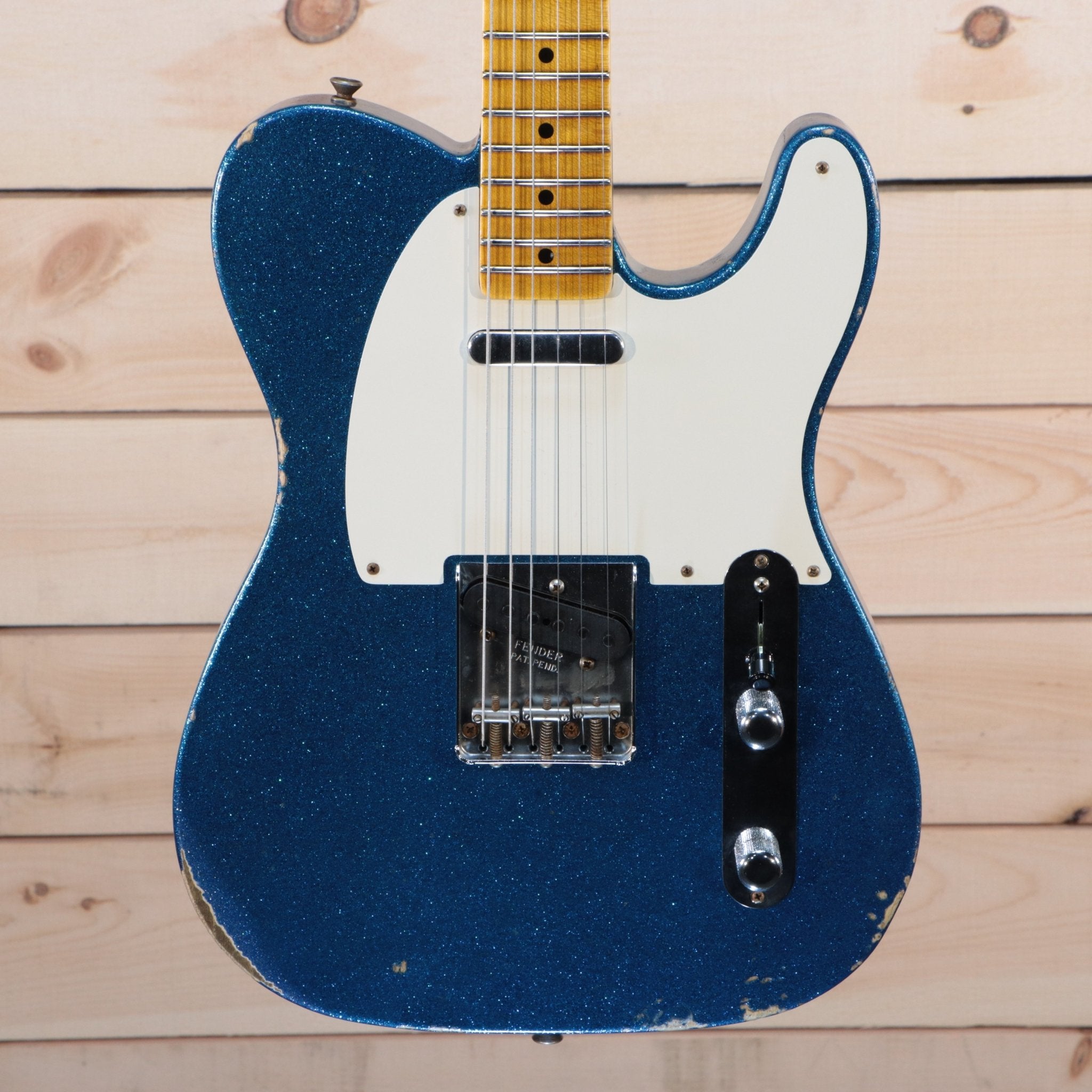 Fender 1955 Telecaster Relic electric guitar Blue Sparkle finish with white pickguard and maple neck