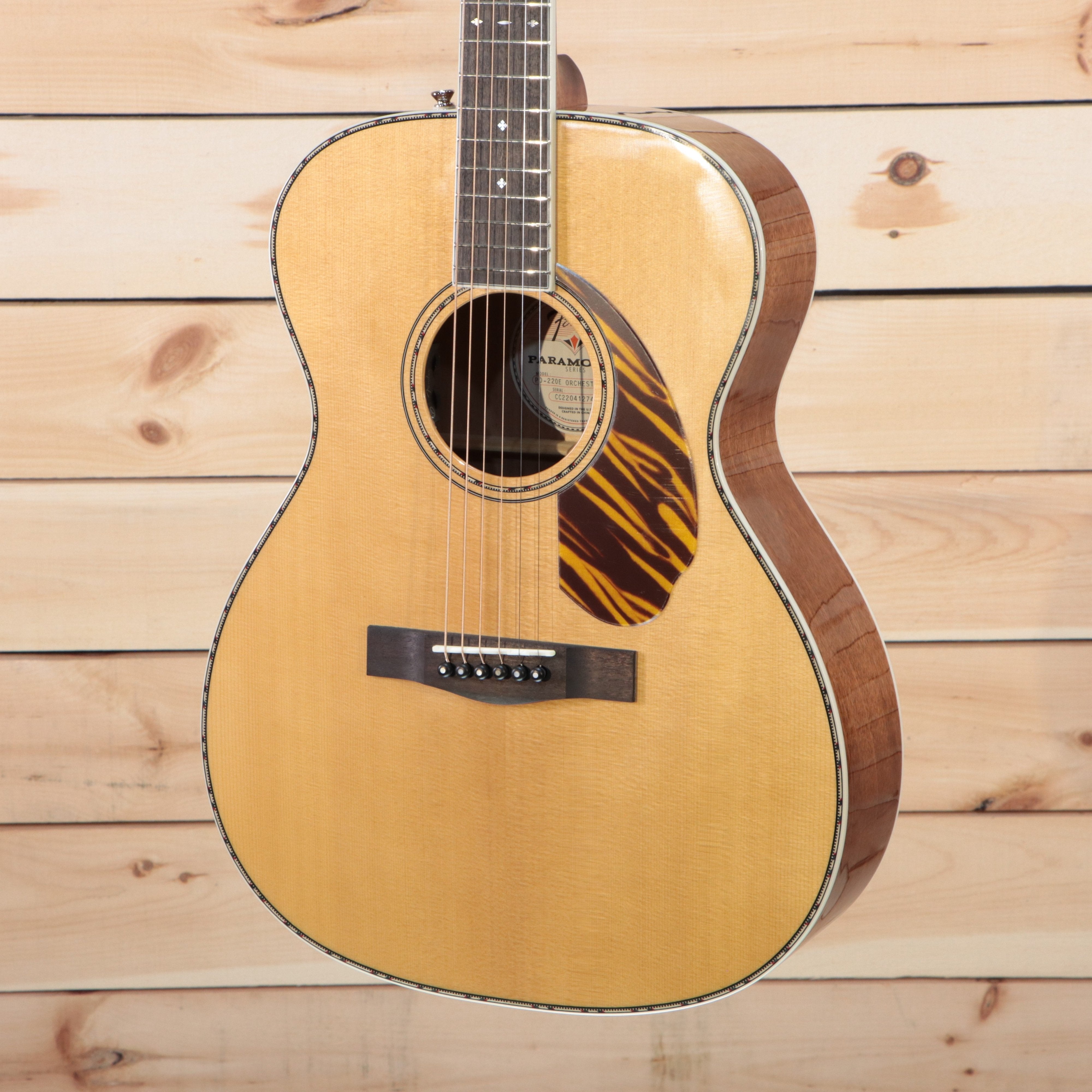 Fender PO-220E Orchestra acoustic guitar natural finish with tortoiseshell pickguard and rosewood binding