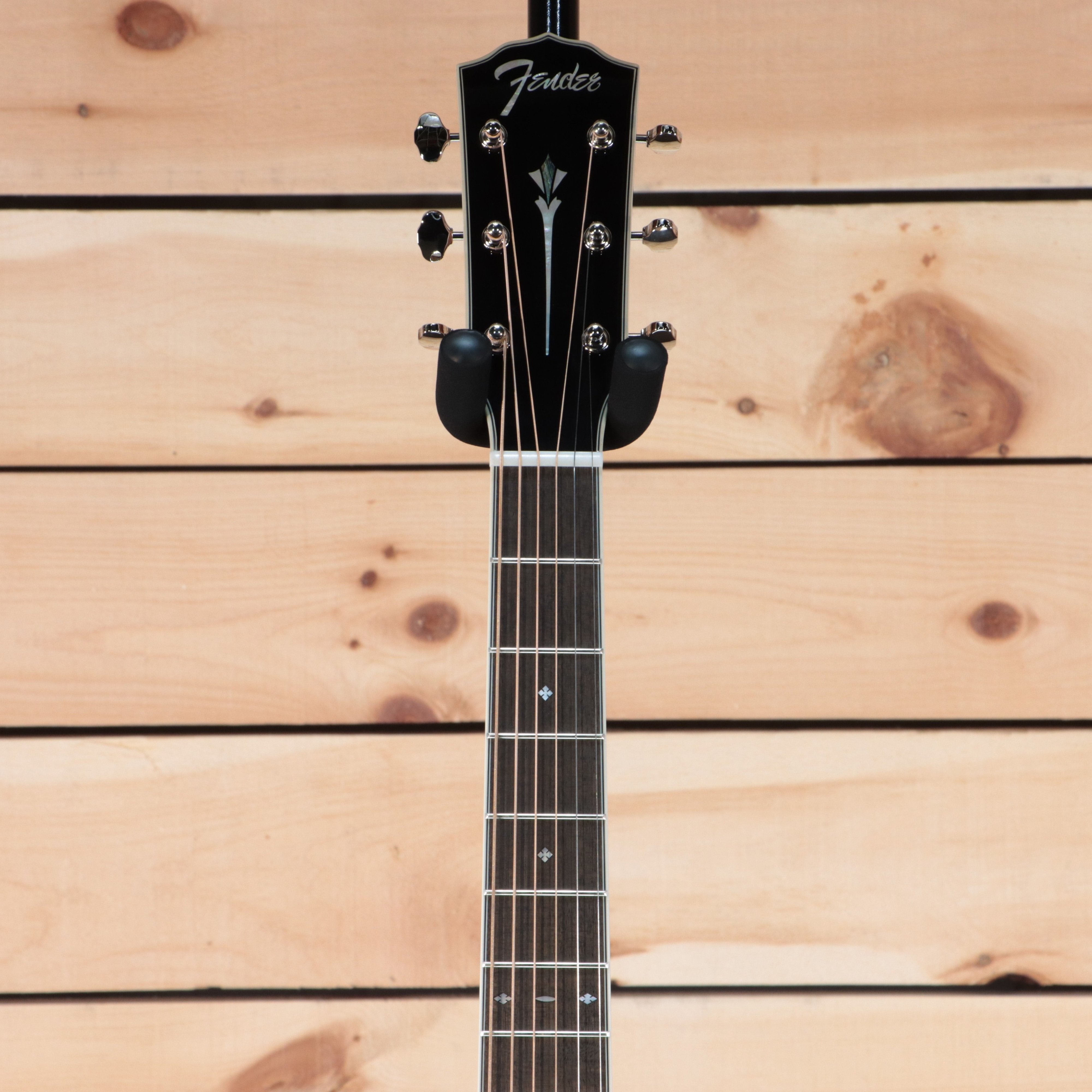 Fender PO-220E acoustic guitar black headstock with diamond fretboard inlays and chrome tuners