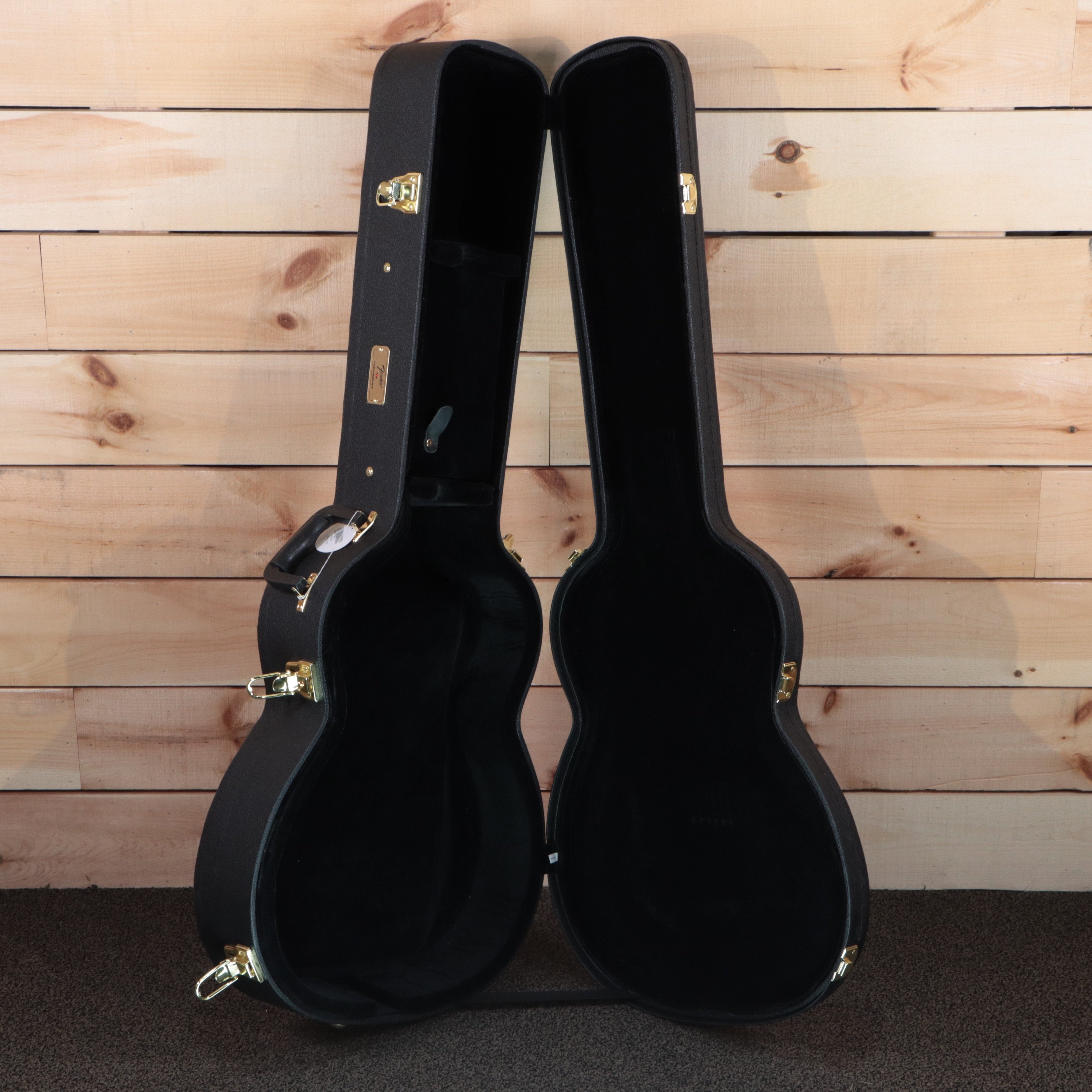 Fender PO-220E acoustic guitar hardshell case open black interior gold hardware latches