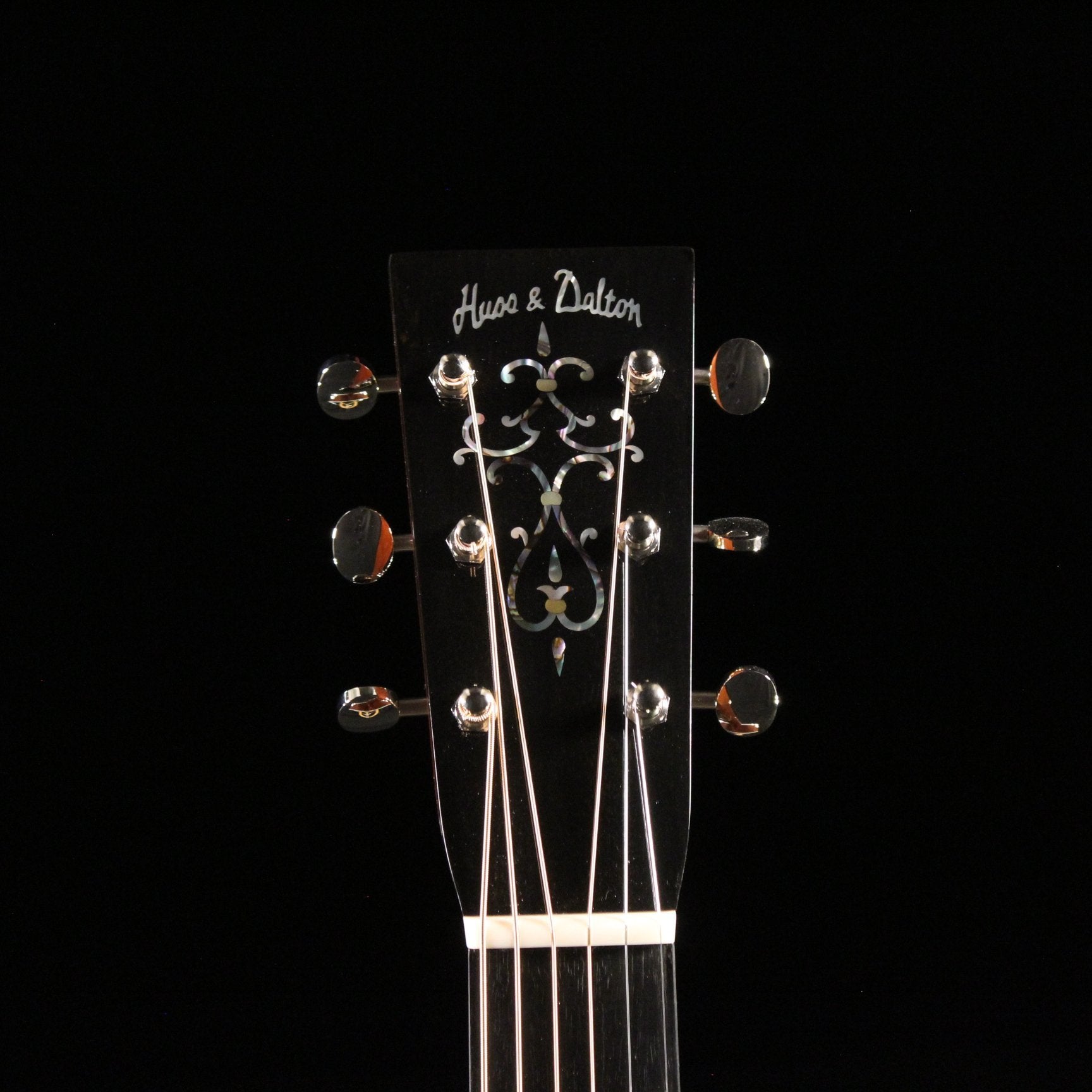 Huss and Dalton TOM-M Custom acoustic guitar headstock with mother-of-pearl inlay and black overlay