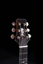 PRS Angelus acoustic guitar headstock with abalone eagle inlay gold tuners and ebony faceplate