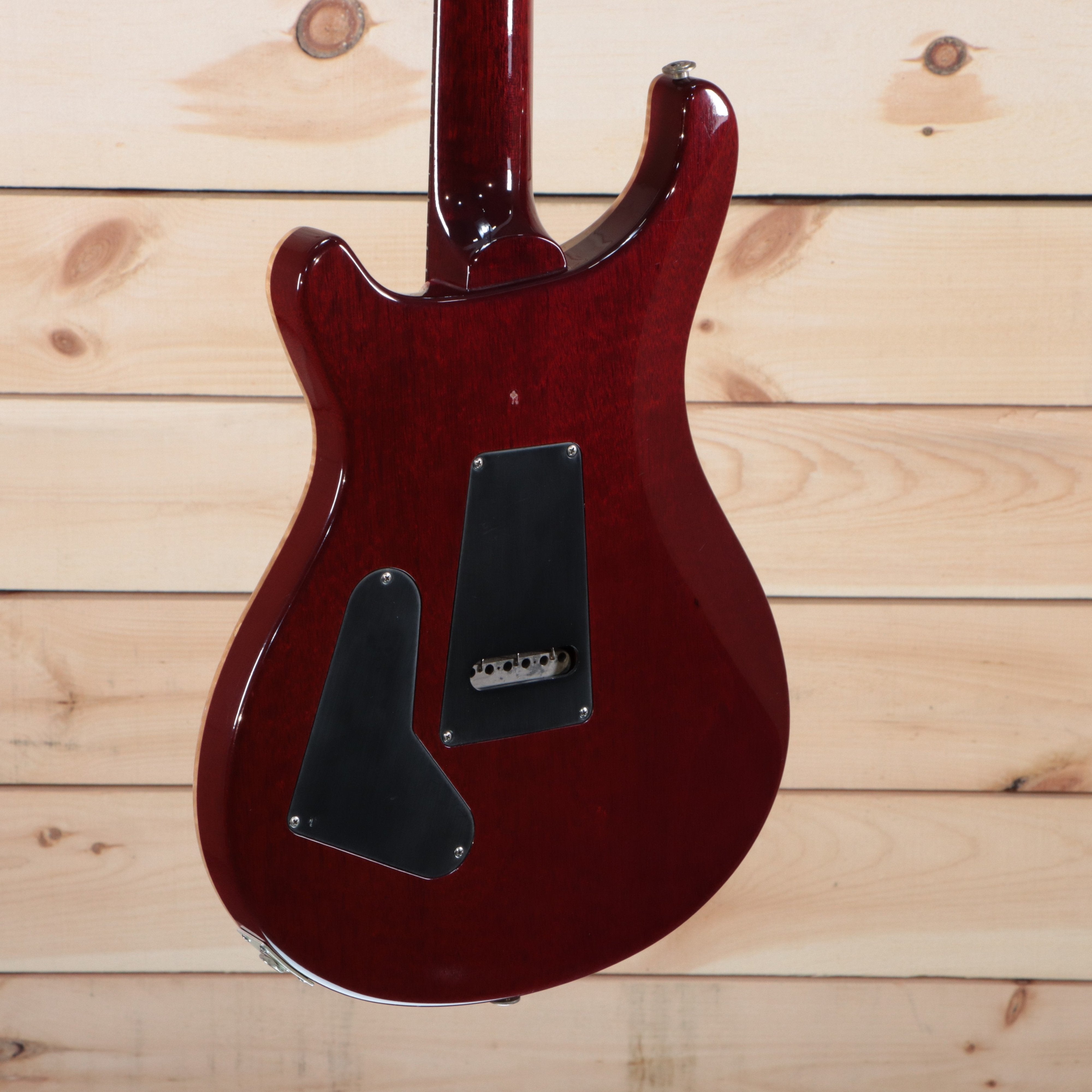 PRS Artist Prototype B-1 electric guitar cherry red back view with dual cavity covers and string-through bridge