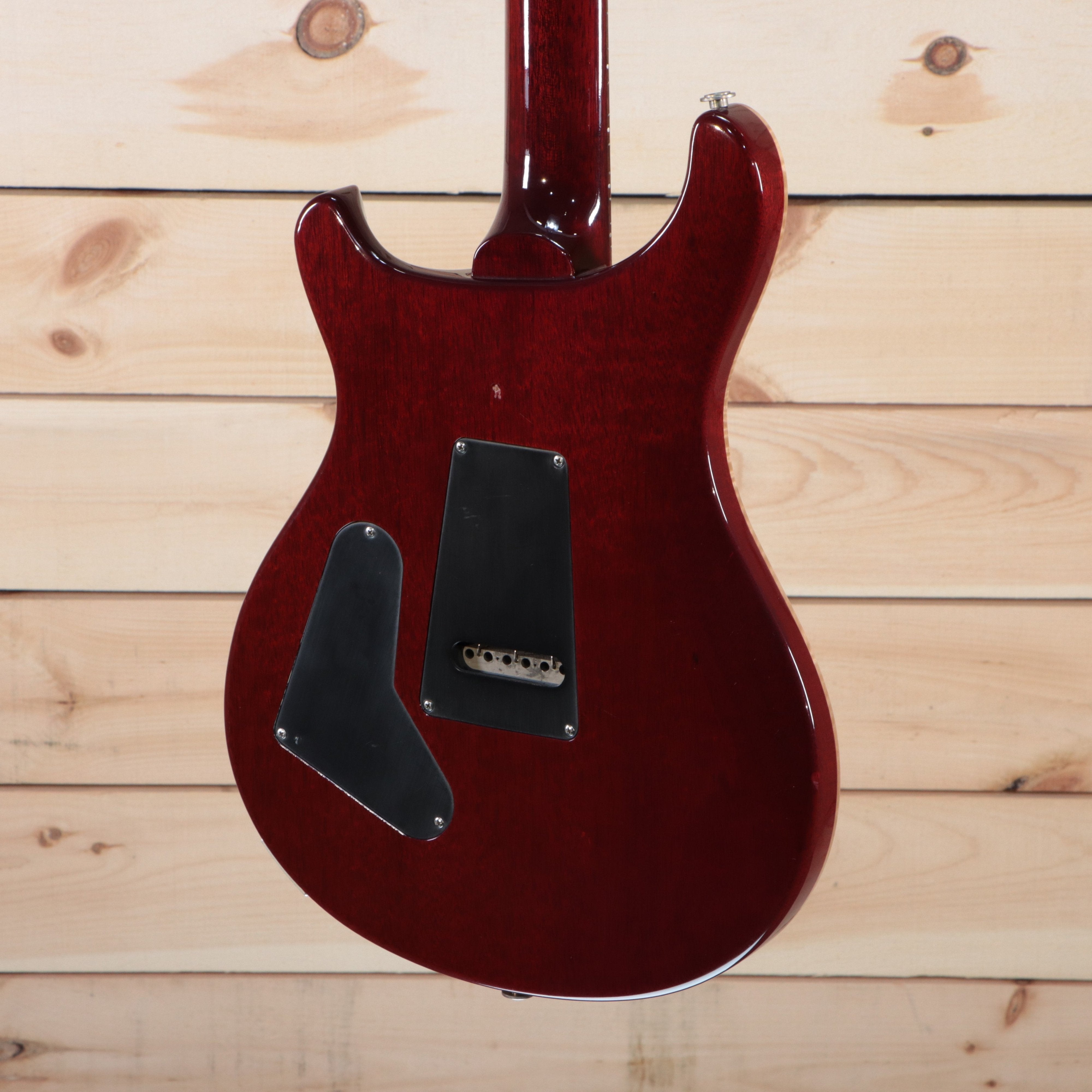 PRS Artist Prototype B-1 electric guitar cherry red back view with dual cavity covers and stoptail bridge