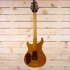 PRS Private Stock 513 electric guitar natural finish back view with decorative cavity covers and through-neck construction