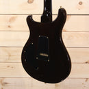 PRS Private Stock Custom 24 electric guitar black finish back view with gold hardware and tremolo cavity cover