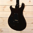 PRS Private Stock Custom 24 electric guitar black finish back view with gold hardware and tremolo cavity cover