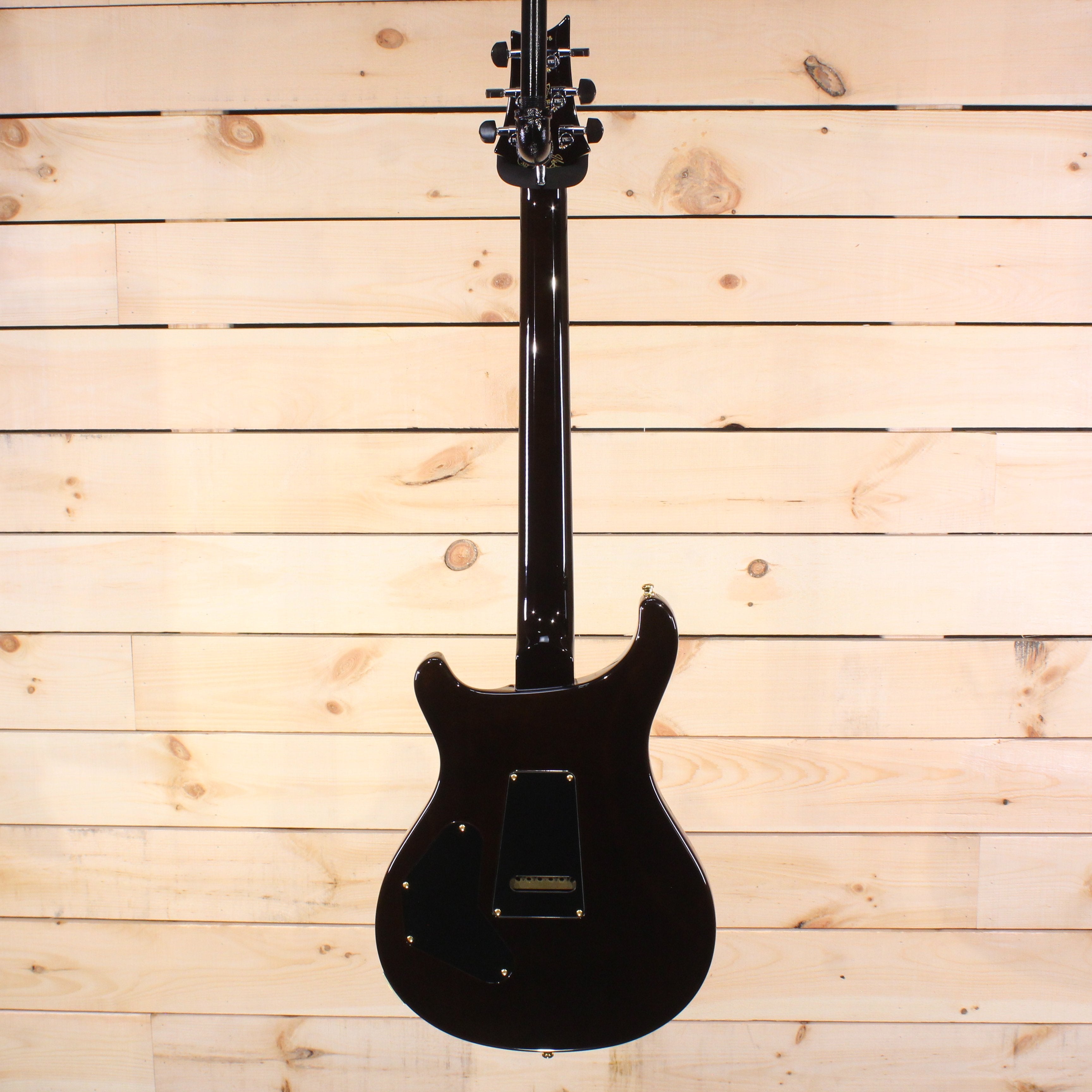 PRS Private Stock Custom 24 electric guitar black finish back view with gold hardware cavity cover