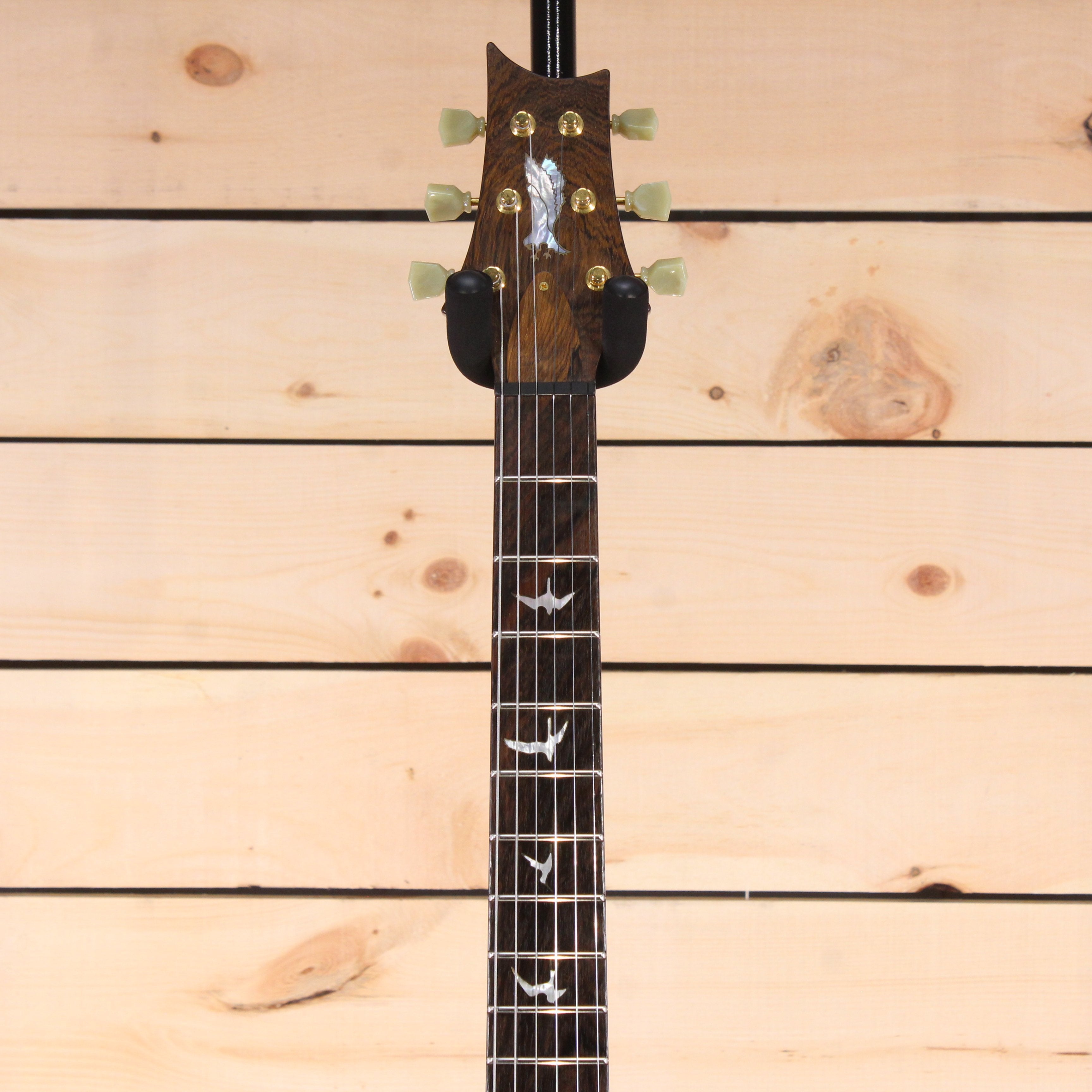 PRS Private Stock McCarty electric guitar exotic wood headstock with bird inlays and gold tuners