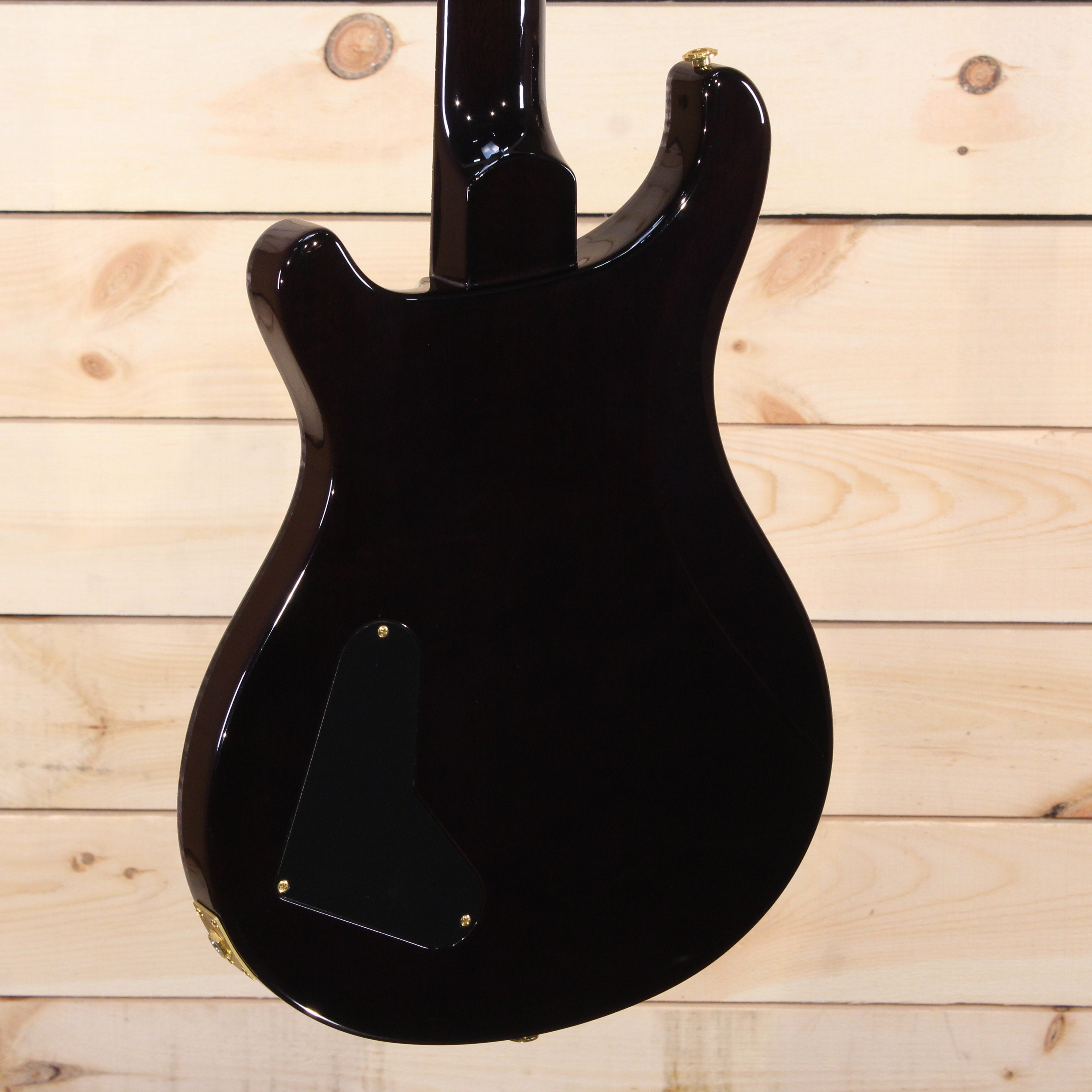 PRS Private Stock McCarty electric guitar black finish back view with gold hardware cavity cover