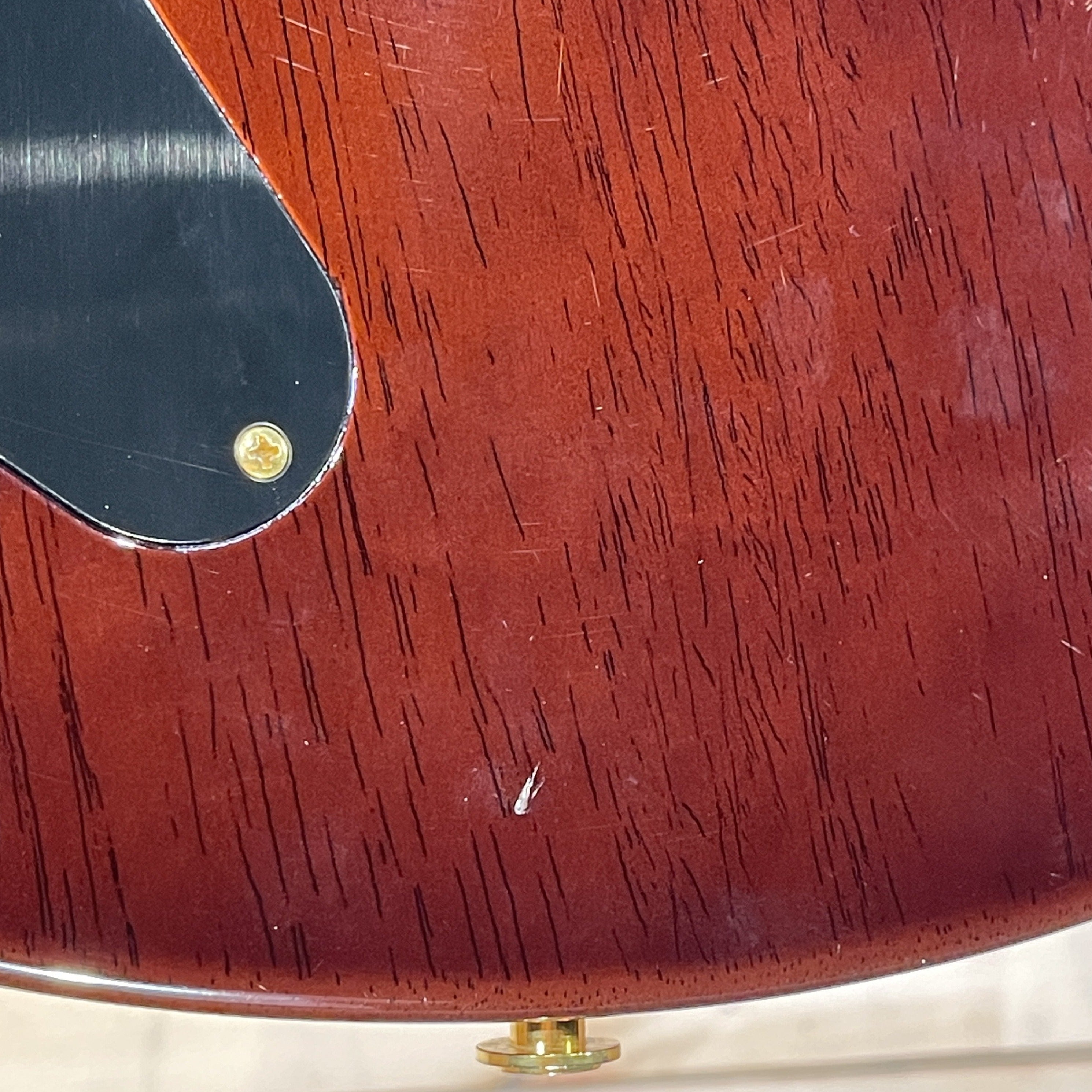 PRS Private Stock Custom 22 electric guitar body detail showing heavily road-worn finish with gold hardware strap button