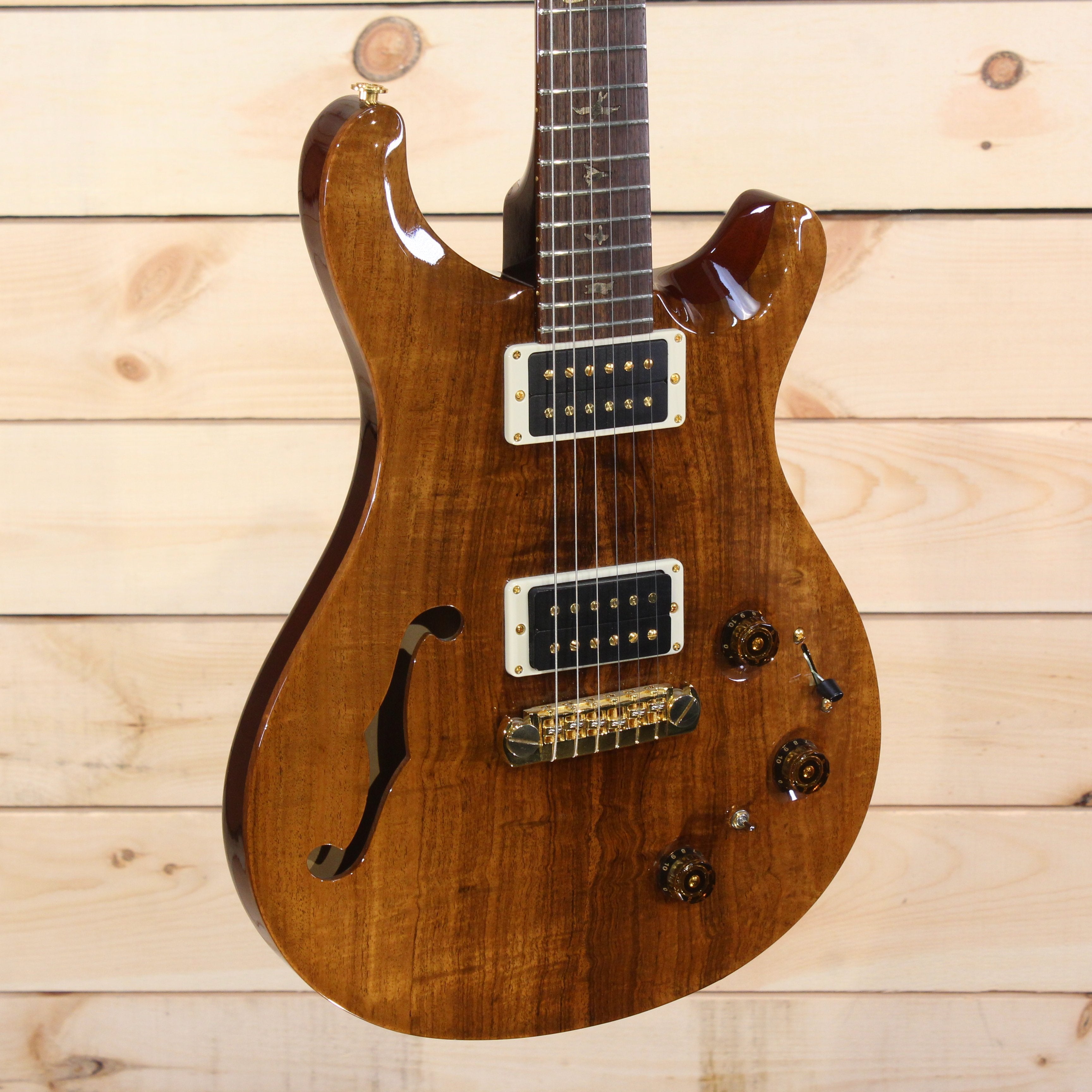 PRS Private Stock Custom 22 semi-hollow electric guitar natural finish with gold hardware and dual humbuckers