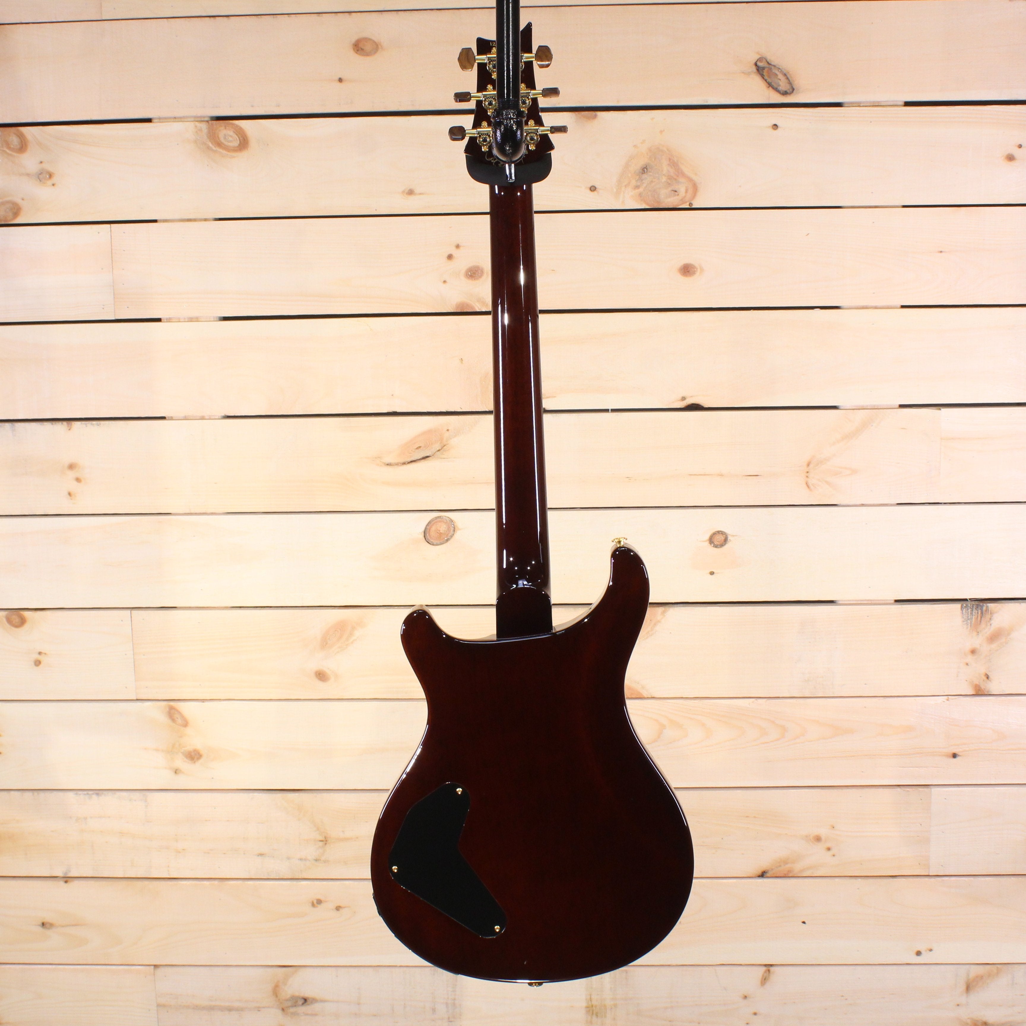 PRS Private Stock Custom 22 electric guitar back view with gold hardware and dark cherry finish control cavity cover