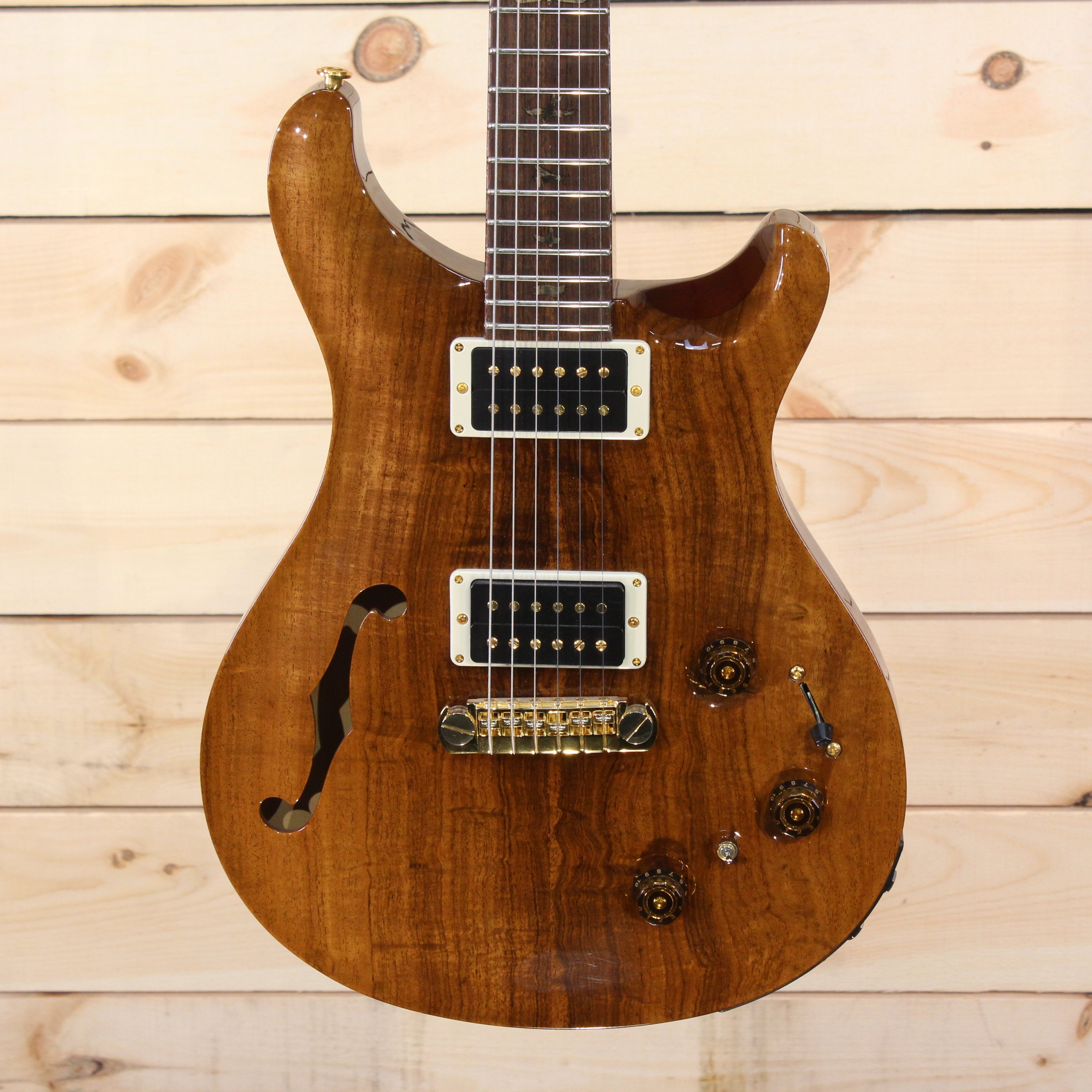 PRS Private Stock Custom 22 semi-hollow electric guitar natural koa top with dual humbuckers and gold hardware