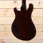 PRS Private Stock Custom 22 electric guitar back view dark finish with black control cavity cover and gold hardware