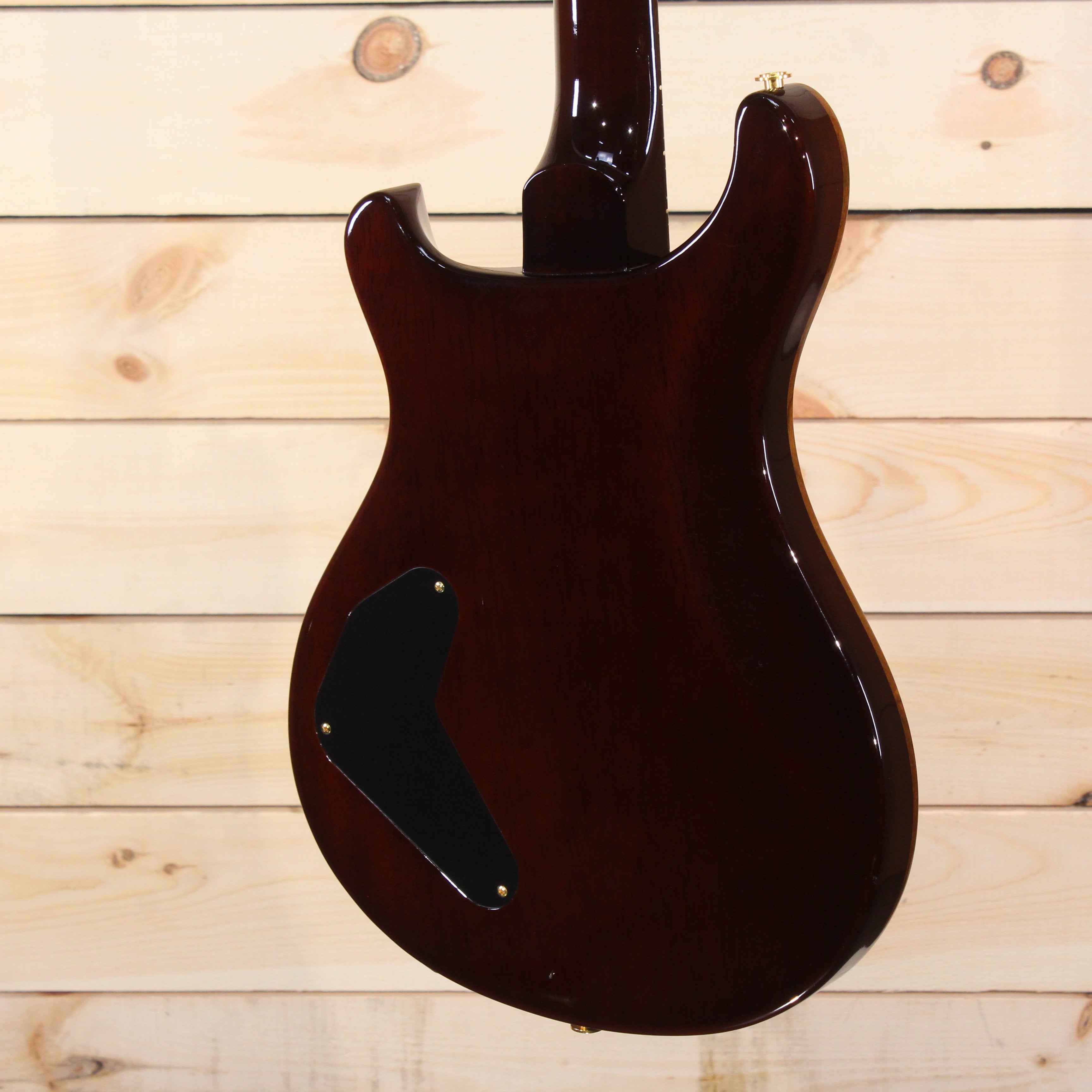 PRS Private Stock Custom 22 electric guitar back view dark finish with black control cavity cover and gold hardware