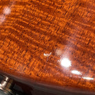 PRS Singlecut electric guitar figured mahogany top with rich amber-red finish and high-gloss lacquer