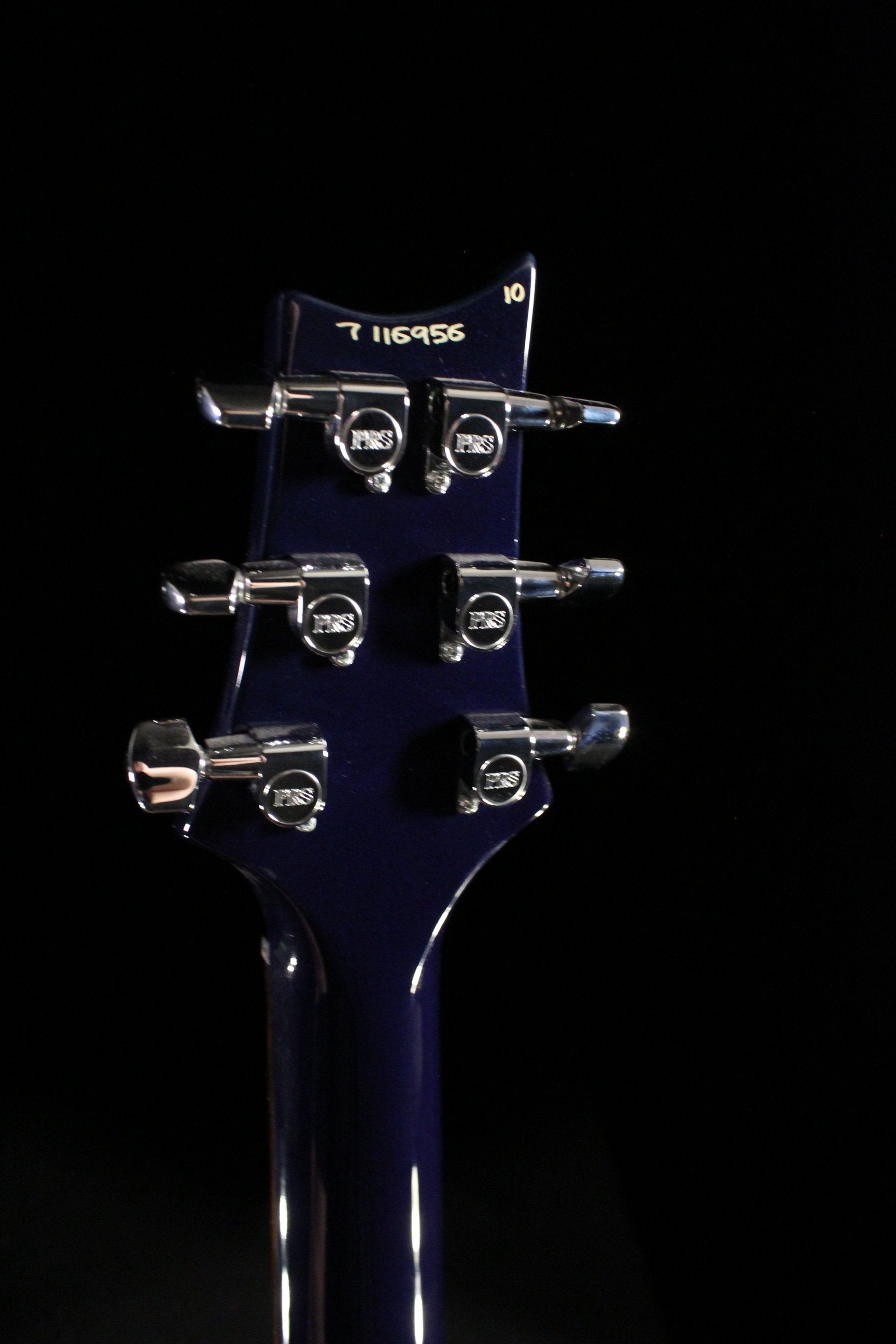 PRS Singlecut Trem electric guitar headstock back showing serial 7116956 with chrome PRS locking tuners