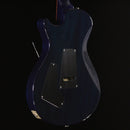 PRS Singlecut Trem electric guitar Violet Blue finish showing rear cavity covers and tremolo spring access