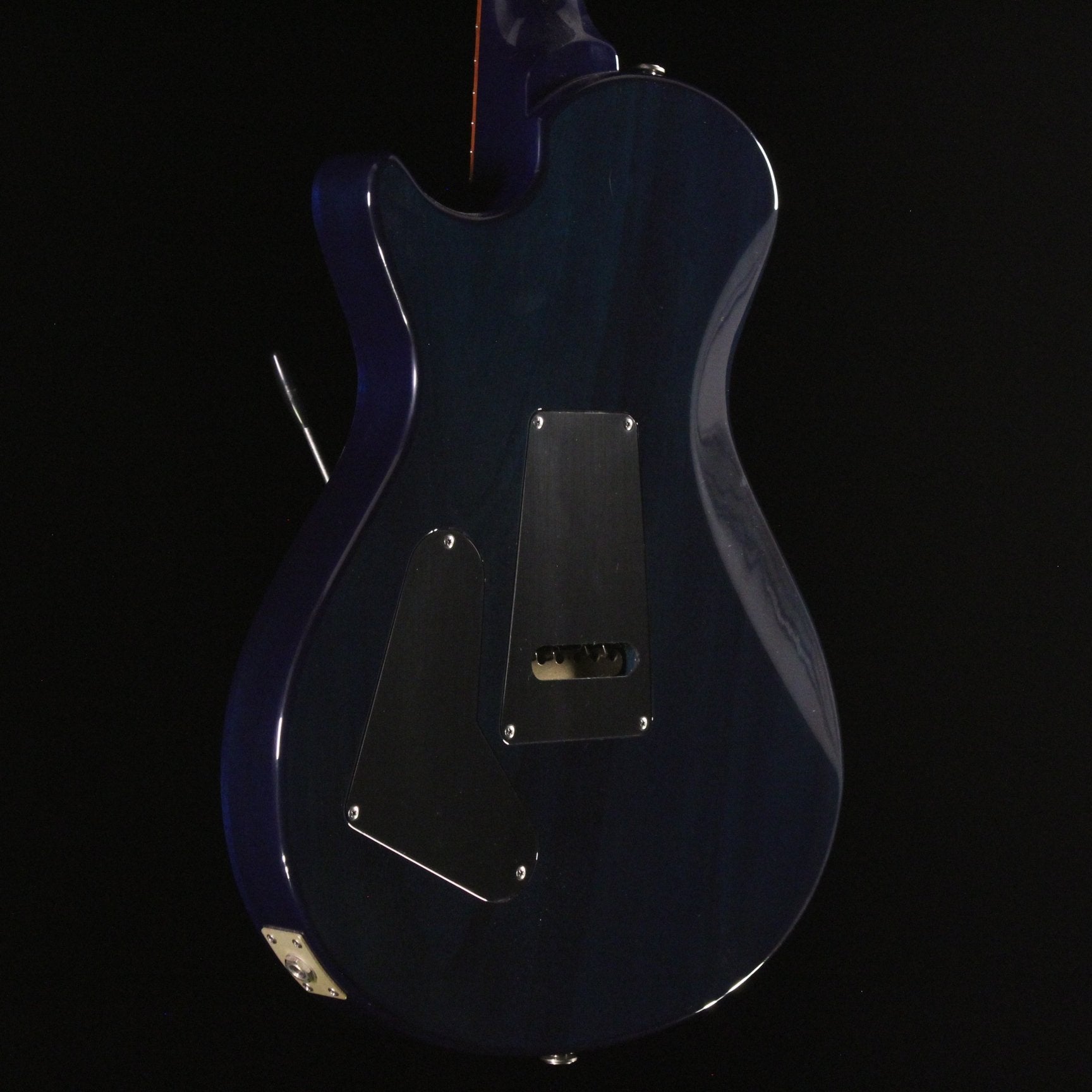 PRS Singlecut Trem electric guitar Violet Blue finish showing rear cavity covers and tremolo spring access