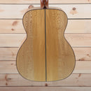 Santa Cruz OM Grand Custom Natural acoustic guitar back showing quilted sycamore two-piece back with center seam binding